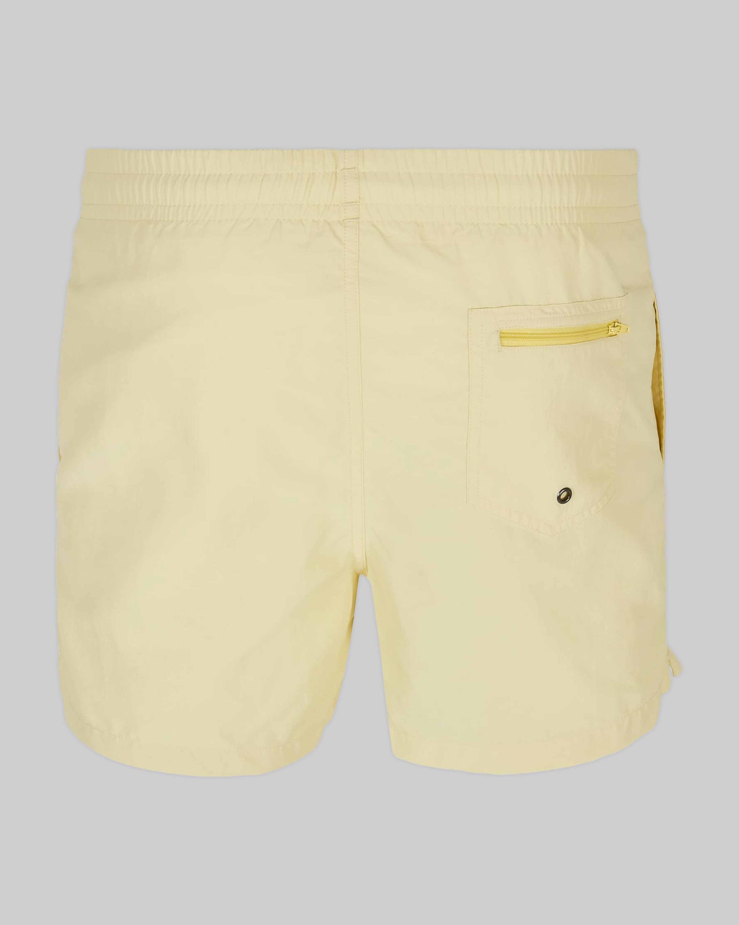 EINHORST® Schwimm- & Sportshorts mit dem Motiv "pride-Regenbogen" in der Farbe "Soft Yellow", Bild von hinten