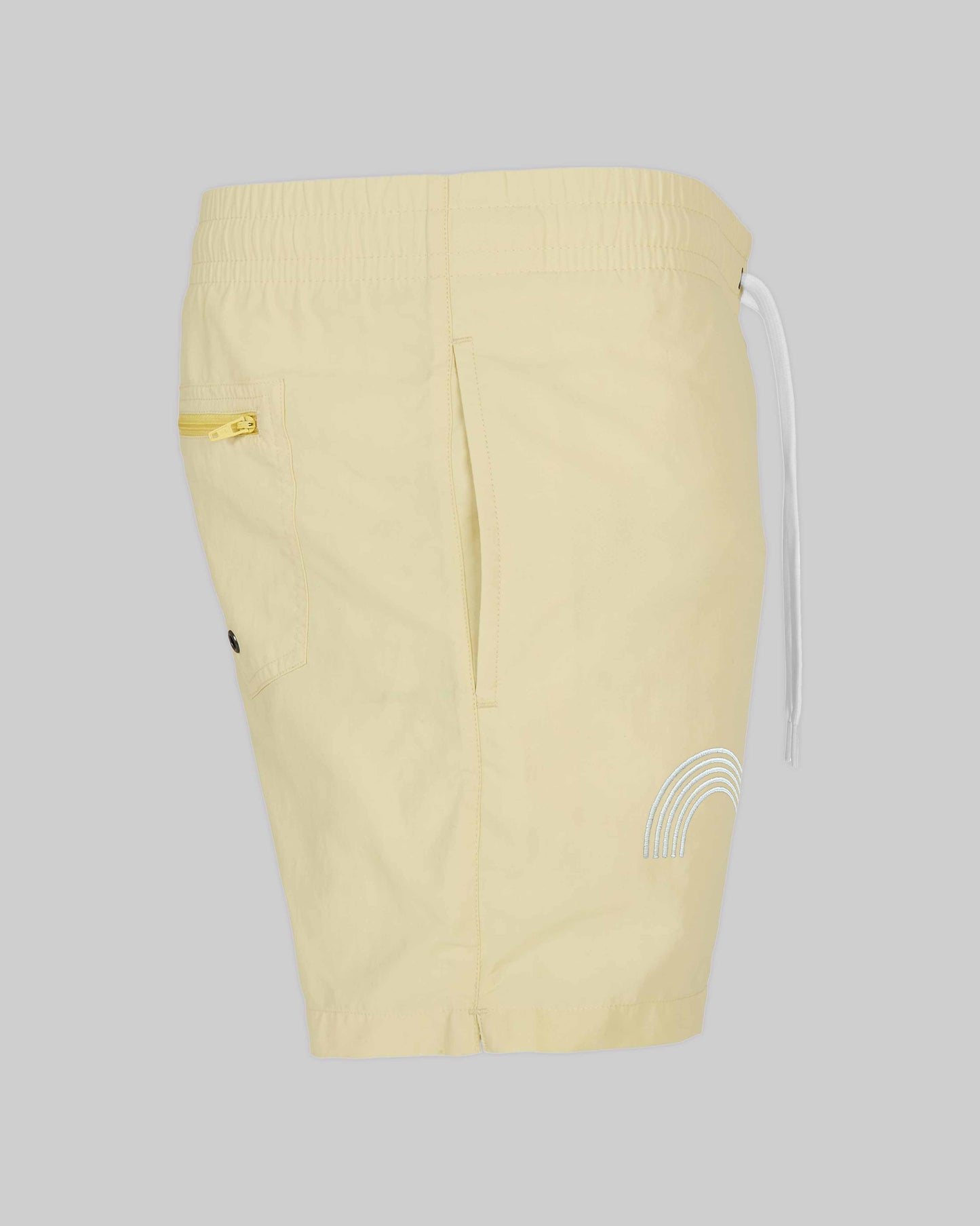 EINHORST® Schwimm- & Sportshorts mit dem Motiv "pride-Regenbogen" in der Farbe "Soft Yellow", Bild von der Seite