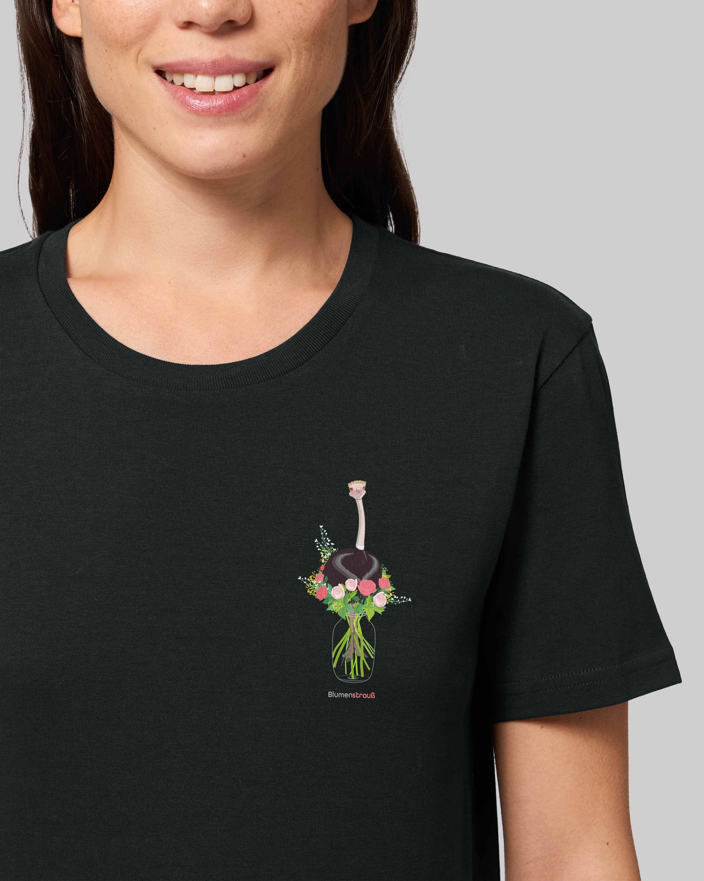 EINHORST® unisex organic Shirt in Schwarz mit dem Motiv "Blumenstrauß", Bild von weiblicher Person mit Shirt
